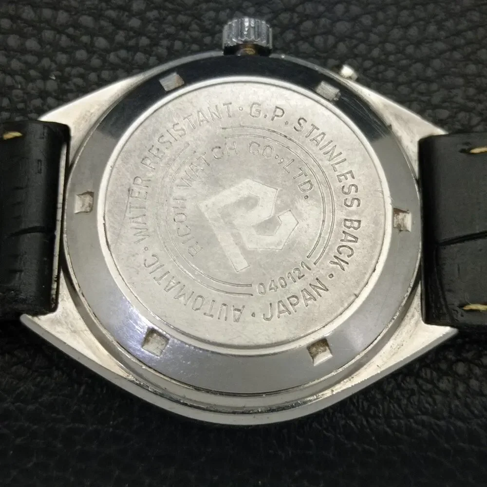 Vintage 1978 Ricoh Automatic Mens Silver Watch W/daydate & Red accents
